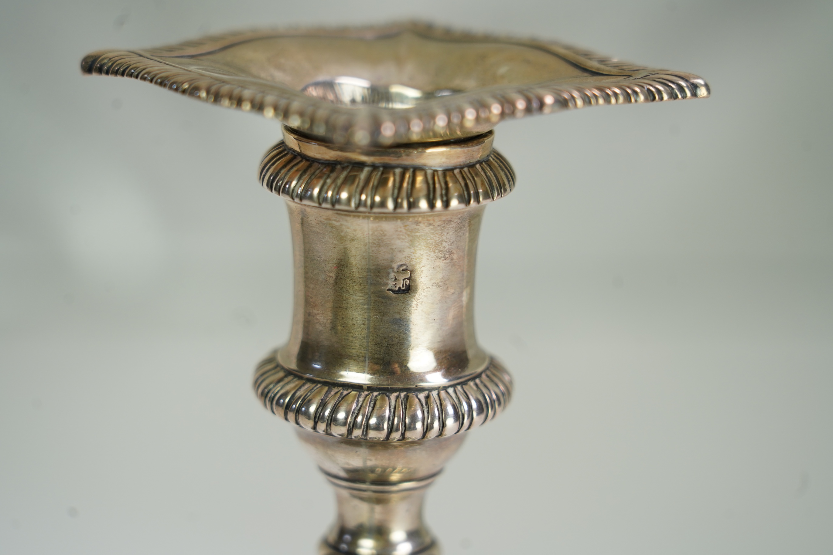 A George III silver candlestick, by John Chapman II